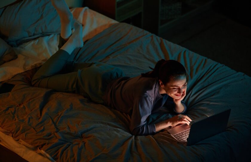 young-woman-watching-movies-at-night-2025-03-09-00-20-30-utc